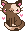 A brown cat with darker and lighter brown spots.