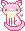 Pink cat with a light colored belly and lower face.